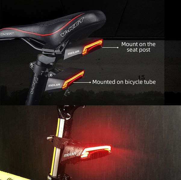 Велофонарь Meilan X5 c указанием поворотов (red+yellow) и лазерной разметкой, waterproof, ЗУ micro USB, Li-Ion v5013 фото